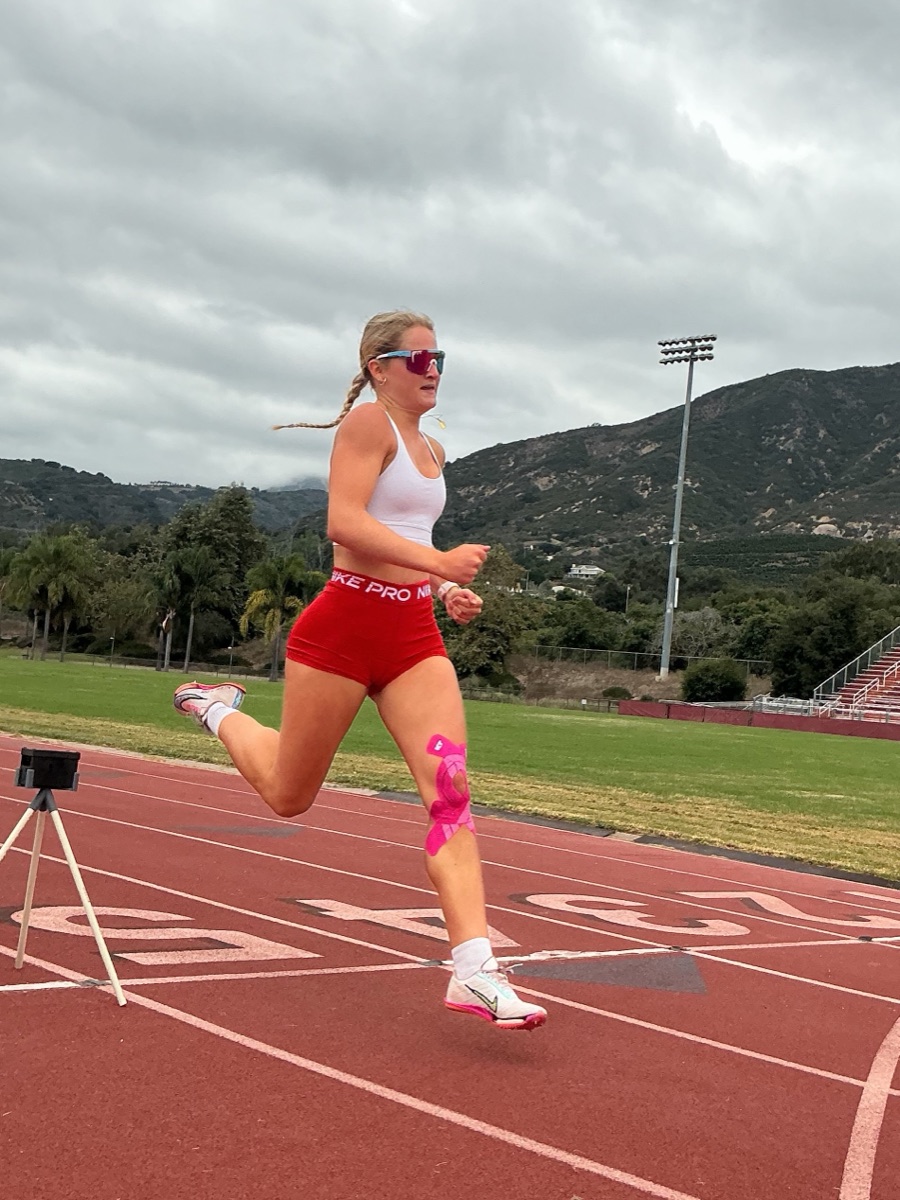 A Carpinteria High athlete sprinting past an EqualSplit timing gate